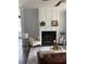 Comfortable living room featuring stylish decor, a fireplace, and ample seating at 304 Ashley Woods Ct, Clayton, NC 27527