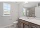 Modern bathroom featuring stylish vanity and a large mirror at 304 White Oak Garden Way # 214, Garner, NC 27529
