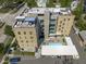 Stunning aerial view of the building, showcasing the rooftop patio and pool at 312 N Buchanan Blvd # 302, Durham, NC 27701