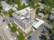 A captivating aerial view of the apartment building with rooftop patios and a convenient covered parking area at 312 N Buchanan Blvd # 302, Durham, NC 27701