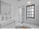 Modern bathroom features a glass shower, sleek toilet, and stylish vanity at 312 N Buchanan Blvd # 302, Durham, NC 27701