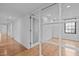 Bright bedroom with hardwood floors is connected with glass doors at 312 N Buchanan Blvd # 302, Durham, NC 27701