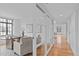 Bright office with hardwood floors, an office desk, and a glass wall at 312 N Buchanan Blvd # 302, Durham, NC 27701