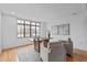Office with hardwood floors, modern decor, and a large window at 312 N Buchanan Blvd # 302, Durham, NC 27701