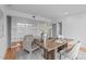 Office with hardwood floors, modern decor, a large desk, and a glass wall at 312 N Buchanan Blvd # 302, Durham, NC 27701