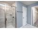 Bathroom with a glass shower and a walk-in closet just off the bathroom at 3412 Pelican Ln, Durham, NC 27703