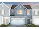 Charming two-story home with a two-car garage and a beautifully landscaped yard at 3412 Pelican Ln, Durham, NC 27703