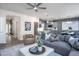 Open-concept living room connected to the kitchen with modern decor and ample seating at 3412 Pelican Ln, Durham, NC 27703