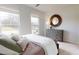 Bright and airy bedroom featuring large windows, neutral colors, and hardwood floors at 345 Broomside Ave, Raleigh, NC 27603