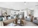 Open concept living room and kitchen area with modern decor, and hardwood floors at 345 Broomside Ave, Raleigh, NC 27603
