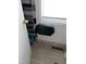 Clean bathroom featuring toilet paper dispenser and tile flooring at 3607 Buffaloe Rd, Raleigh, NC 27604