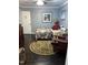 Serene bedroom with bed, area rug, rocking chair, and decorative wall art at 3607 Buffaloe Rd, Raleigh, NC 27604
