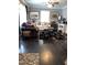 Cozy living room with hardwood floors, patterned sofas, and a decorative rug at 3607 Buffaloe Rd, Raleigh, NC 27604