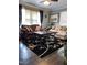 Comfortable living room with stylish sofas, dark wood floors, and natural light at 3607 Buffaloe Rd, Raleigh, NC 27604