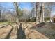 Large grassy backyard with mature trees and plenty of space at 3639 Nc Highway 39, Selma, NC 27576