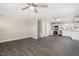 Inviting living room open to the kitchen featuring hardwood floors and neutral walls at 3639 Nc Highway 39, Selma, NC 27576