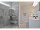 Elegant bathroom with a glass-enclosed shower, tile surround, a built-in bench, and a modern vanity at 37 E American Marigold Dr # 35, Benson, NC 27504