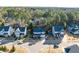 An aerial view of the neighborhood shows the house's location within a community of similar homes at 401 River Falls Dr, Apex, NC 27539