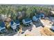 An aerial view of the neighborhood shows the house's location within a community of similar homes at 401 River Falls Dr, Apex, NC 27539