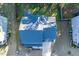 Aerial view showcases the home's roof, driveway, landscaping, and proximity to neighboring houses at 401 River Falls Dr, Apex, NC 27539