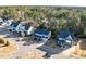 An aerial view of the neighborhood shows the house's location within a community of similar homes at 401 River Falls Dr, Apex, NC 27539