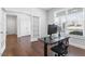 Spacious office features great natural light, hardwood floors, and modern workspace setup at 401 River Falls Dr, Apex, NC 27539