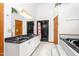 Bathroom boasts double sinks, walk-in shower, tub and dark accents at 4639 Reid Rd, Elon, NC 27244