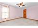 Neutral-colored bedroom featuring a ceiling fan and one window at 4639 Reid Rd, Elon, NC 27244