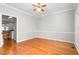 Inviting dining room featuring hardwood floors, ample natural light, and easy access to the kitchen at 4639 Reid Rd, Elon, NC 27244