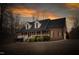 Beautiful brick home features a spacious porch and well-manicured landscaping at 4639 Reid Rd, Elon, NC 27244