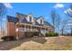 Charming brick home with a spacious porch and dormers offering curb appeal at 4639 Reid Rd, Elon, NC 27244