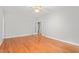 Bright and airy living room features hardwood floors and French doors leading to additional space at 4639 Reid Rd, Elon, NC 27244