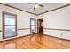 Bright living room boasting hardwood floors, large windows, and natural light at 4639 Reid Rd, Elon, NC 27244