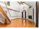 Living room features vaulted ceilings, fireplace, and hardwood floors at 4639 Reid Rd, Elon, NC 27244
