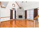 Cozy living room featuring vaulted ceilings, fireplace, and hardwood floors at 4639 Reid Rd, Elon, NC 27244