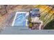 Overhead shot of a pool area and patio with stone features, as seen from the roof of the house at 4639 Reid Rd, Elon, NC 27244