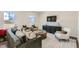Bright living room with stylish furniture, modern decor, and large windows for natural light at 484 Barnes Landing Dr, Four Oaks, NC 27524
