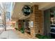 Stylish bar exterior with stone accents and modern signage, creating an inviting atmosphere for patrons at 521 N Mangum St # 33, Durham, NC 27701