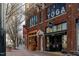 A beautiful red brick commercial building featuring a yoga studio and restaurant with a cozy sidewalk at 521 N Mangum St # 33, Durham, NC 27701