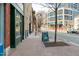 A beautiful exterior shot of commercial buildings with red brick sidewalks and businesses on a sunny day at 521 N Mangum St # 33, Durham, NC 27701