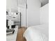Bright kitchen features stainless steel appliances, hardwood floors, and white cabinets at 521 N Mangum St # 33, Durham, NC 27701