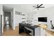 Open living space featuring sleek modern decor, hardwood floors, and stylish furniture at 521 N Mangum St # 33, Durham, NC 27701