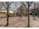 An inviting public plaza with tables, benches, and trees, creating an open and relaxing space at 521 N Mangum St # 33, Durham, NC 27701