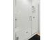 Modern shower features white tiled walls, a glass door, and a shower caddy at 521 N Mangum St # 33, Durham, NC 27701
