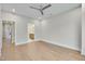 Bright bedroom with hardwood floors leading to bathroom and closet at 777 Willard St, Durham, NC 27701