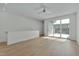 Bright bedroom featuring a ceiling fan, recessed lighting and a sliding glass door to a balcony at 777 Willard St, Durham, NC 27701