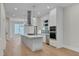 Open kitchen featuring stainless steel appliances and a sleek center island at 777 Willard St, Durham, NC 27701