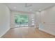 Bright living room with hardwood floors, large sliding glass doors and ample natural light at 777 Willard St, Durham, NC 27701