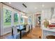 Open dining area with large windows overlooking backyard at 83 Stickleback Dr, Willow Springs, NC 27592