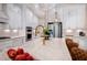 Well-appointed kitchen with stainless steel appliances, white cabinetry and a large center island at 83 Stickleback Dr, Willow Springs, NC 27592